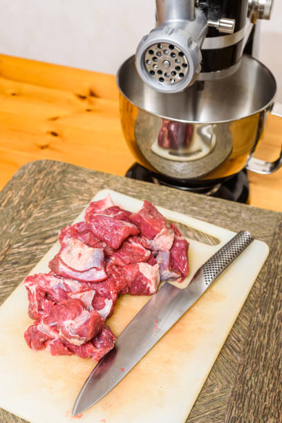 istock Raw meat on cutting board ready to be minced 1075135054