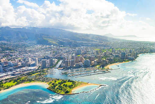 Beautiful aerial view on the island of Oahu, Honolulu city on Hawaii from the sea plane.
