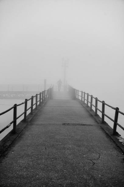 istock Footbridge in a Misty Day 1075153854