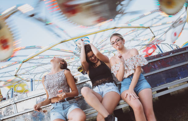 istock Girls fooling around with lollipops 1075167996