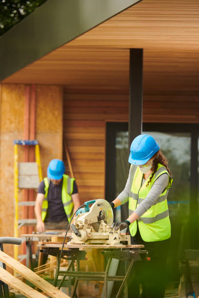 istock female joiner on housebuild 1075177968