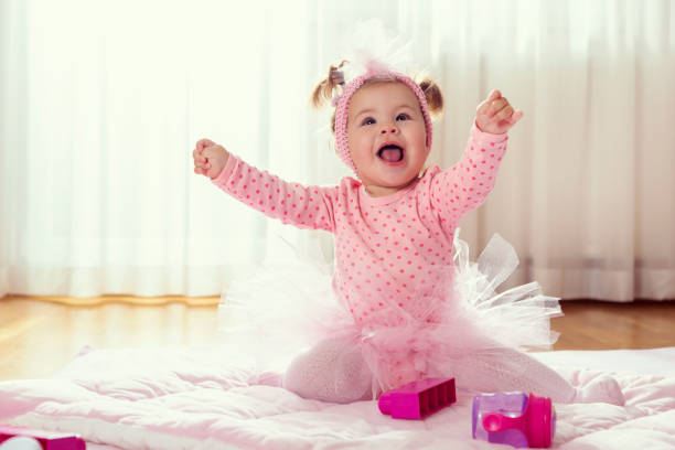 istock Playful baby girl smiling 1075178554