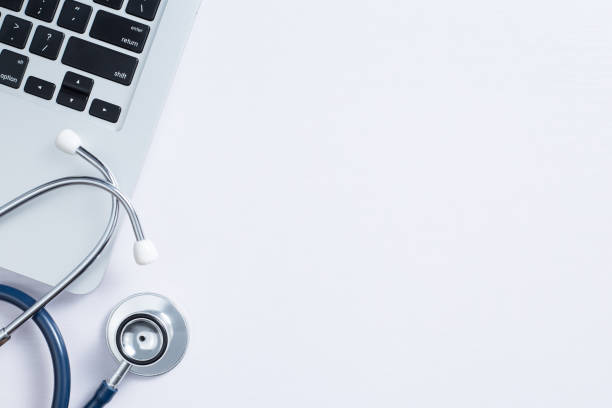istock Workplace Of Doctor With Laptop And Stethoscope With Copy Space 1075193934