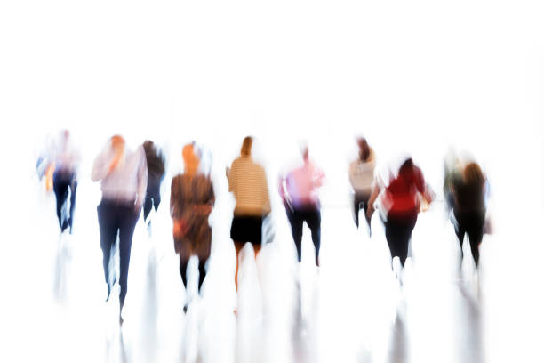 istock Motion Blurred Group of Businesss People 1075205576