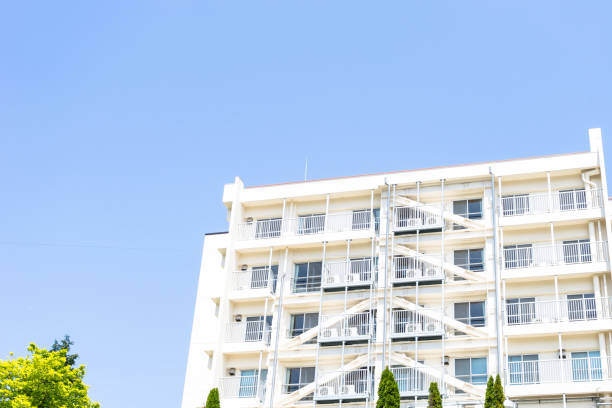 istock High-rise residential and blue sky 1075221354