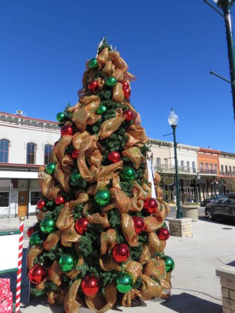 istock Christmas tree outdoors in old Western town square 1075223122
