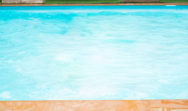 istock Blur blue water in swim pool. 1075263816