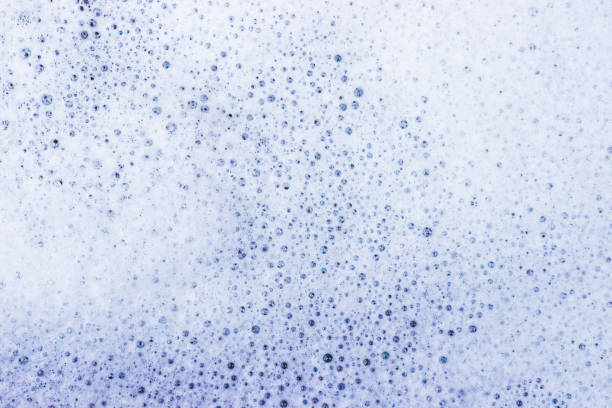 istock White bubble of detergent in blue container for background. Abstract texture. 1075263962