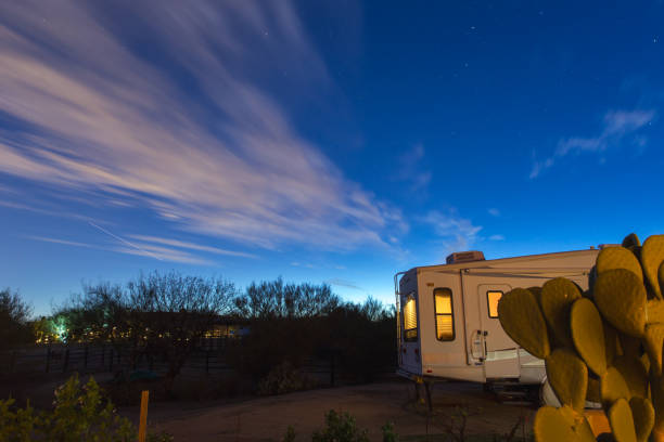 Night Sky Over RV Camper, Desert Camp Site, Desert Camping stock photo