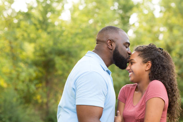 istock Father kissing his daughter. 1075278444