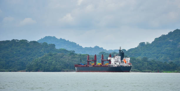 istock Cargo ship makes its way through waterways of the Panama Canal. 1075289124