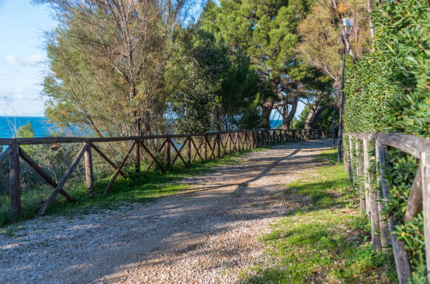 istock Stone Path Along the Southern Italian Mediterranean Coast 1075297644