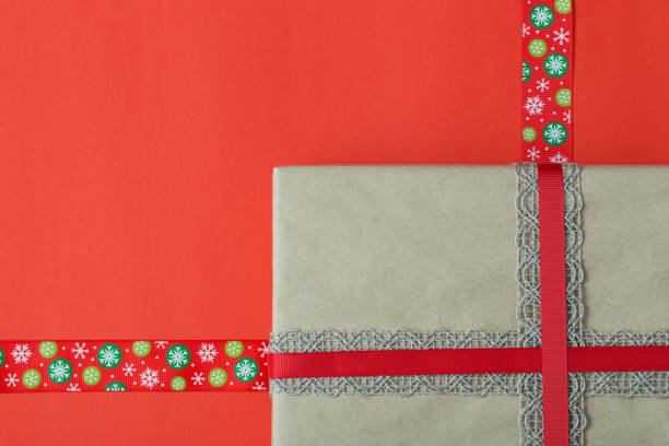 istock Christmas gift on paper background 1075305588