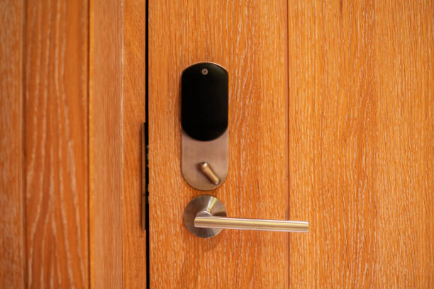 istock smart lock on wooden door 1075312402