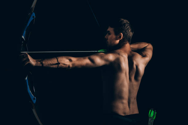 istock Man with the bow and arrow 1075315002