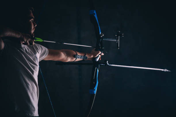 istock Young archer with the bow and arrow 1075315242