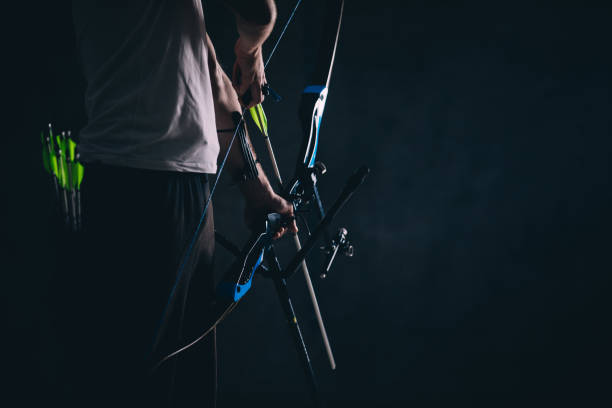 istock Young archer with the bow and arrow 1075315394
