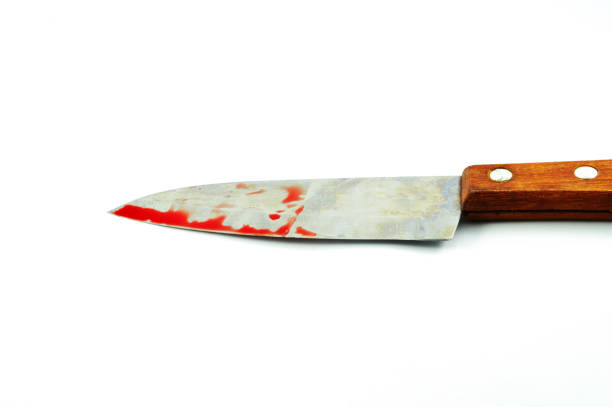 istock knife with blood / kitchen knife with red blood 1075323268