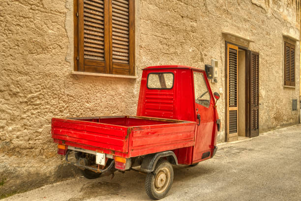 Tricycle trucks, shuttered windows and doors on narrow streets. That's Favignana, Sicily