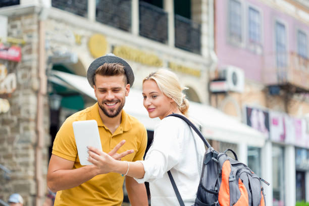 istock Young couple traveling. 1075330354