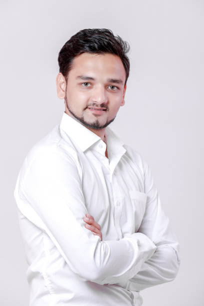 istock young indian man Standing isolated over white background 1075331830