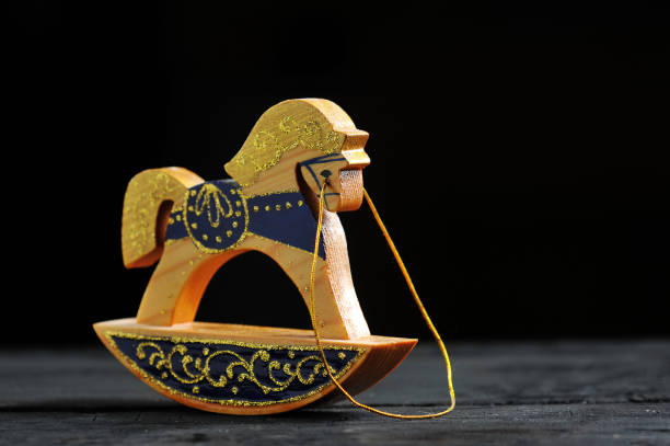 istock wooden toy horse on a dark background 1075340162