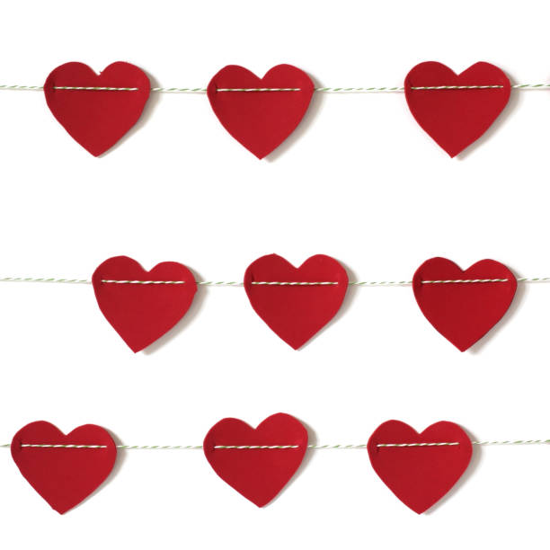 istock red paper heart hanging on the clothesline 1075343244