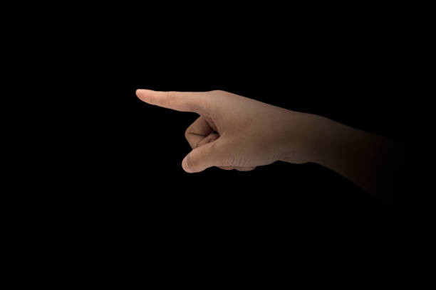 istock Male hand finger sign over dark background 1075344742
