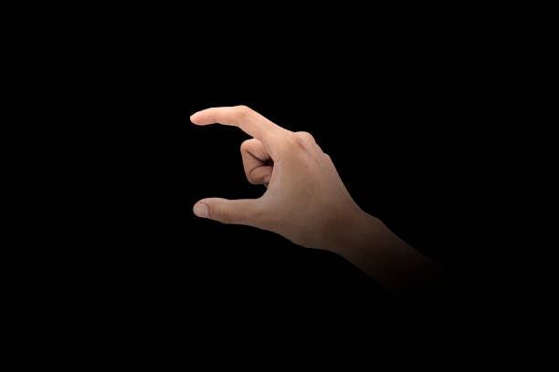 istock Male hand finger sign over dark background 1075344870