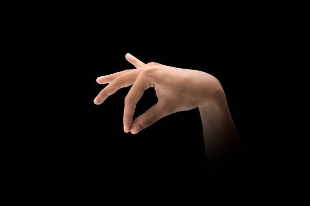 istock Male hand finger sign over dark background 1075345014