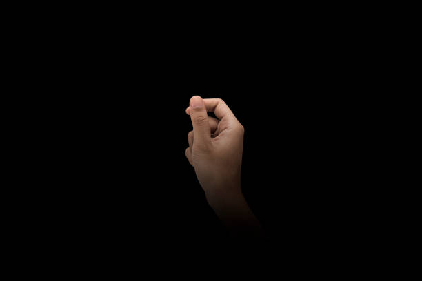 istock Male hand finger sign over dark background 1075345102