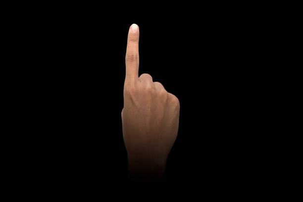 istock Male hand finger sign over dark background 1075345256