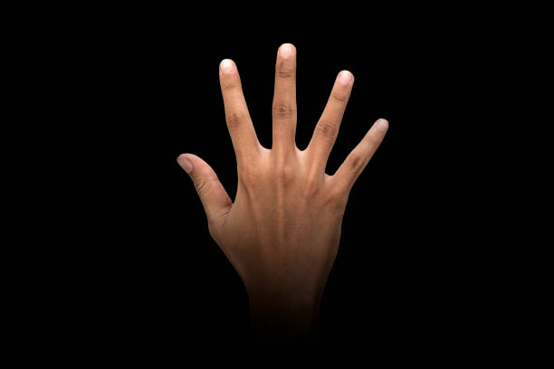 istock Male hand finger sign over dark background 1075345438