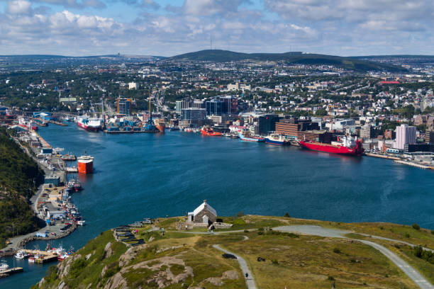 St. John's harbour and city scape from Signal hill A cityscape view of St. John's harbor and city taken from Signal hill park in Newfoundland Canada. st. johns newfoundland photos stock pictures, royalty-free photos & images