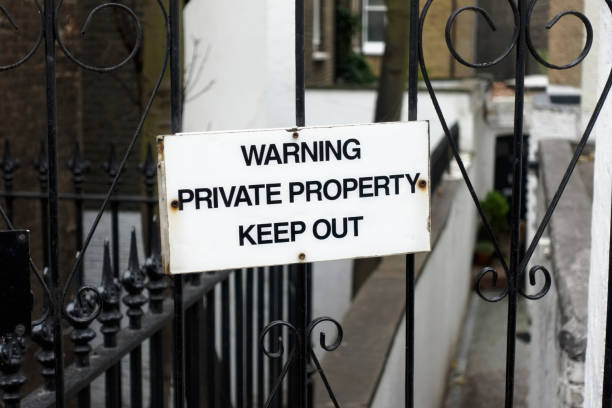 istock Private property sign on gate door in London keep out 1075363088