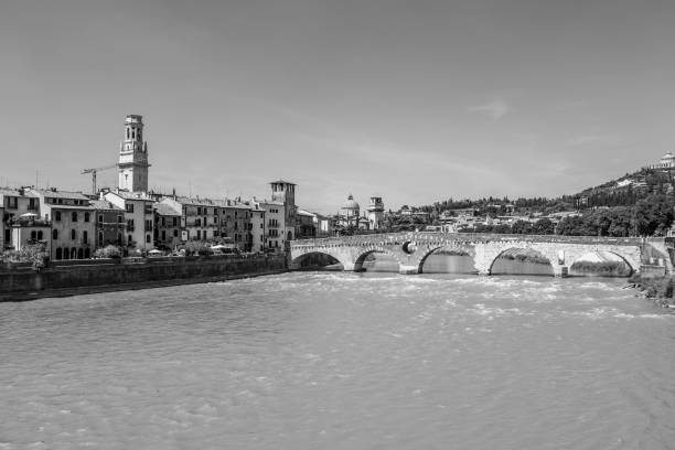 istock old roman bridge in Verona  spans the river Etsch 1075366254