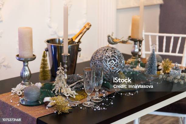 Festive Table With Christmas Decorations In The Home Interior Stock Photo - Download Image Now