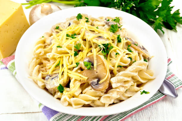 istock Fusilli with mushrooms and cream on towel 1075373642