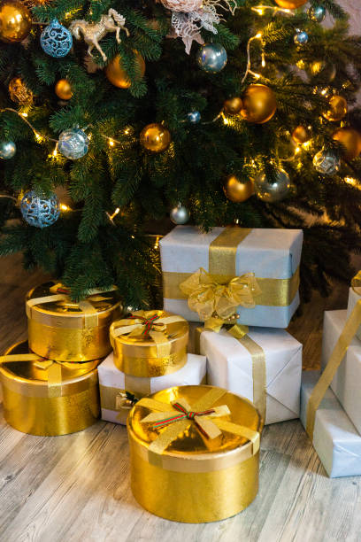 istock Elegant christmas tree with decorations and gifts 1075374864