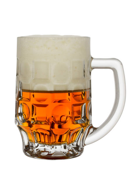 mug with amber beer and big foam on a white background - amber beer imagens e fotografias de stock