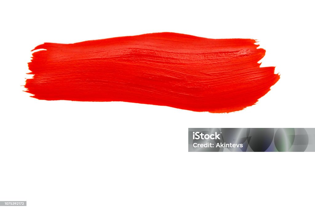 red trace of the brush bright red trace of the brush on white paper Paint Stock Photo