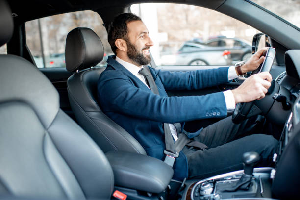 istock Businessman driving a car 1075396998