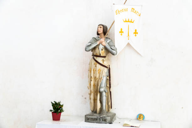 Ars-en-Re, France. Statue of Joan of Arc inside the Eglise Saint-Etienne church