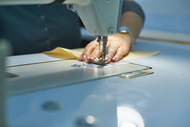 istock A woman sews on an electric sewing machine. 1075425746
