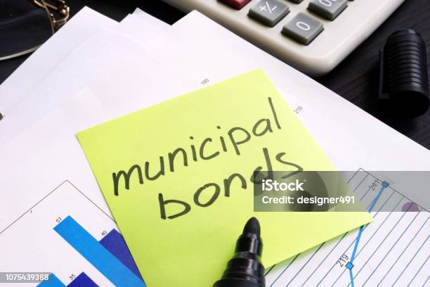 Municipal Bond Written On A Memo Stick And Documents Stock Photo - Download Image Now