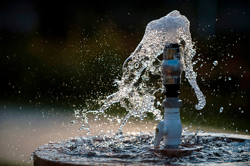 Close-up of water splash in public park fountain, Turkey.