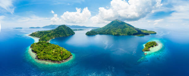 istock Aerial view Banda Islands Moluccas archipelago Indonesia, Pulau Gunung Api, lava flows, coral reef white sand beach. Top travel tourist destination, best diving snorkeling. 1075446592