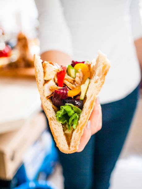 istock Woman with kebab 1075451174