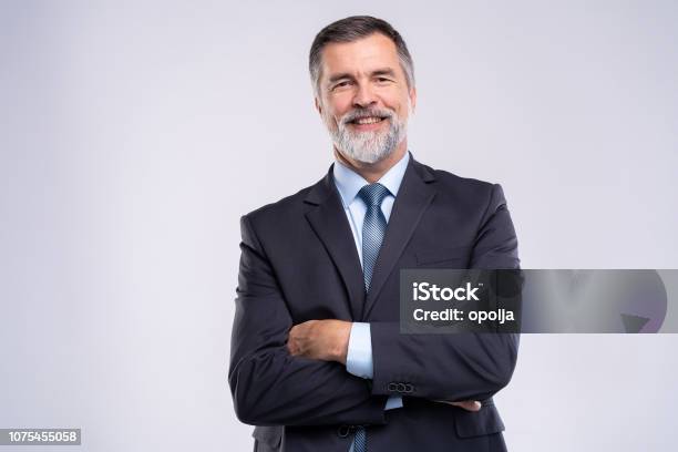 Happy Satisfied Mature Businessman Looking At Camera Isolated On White Background Stock Photo - Download Image Now