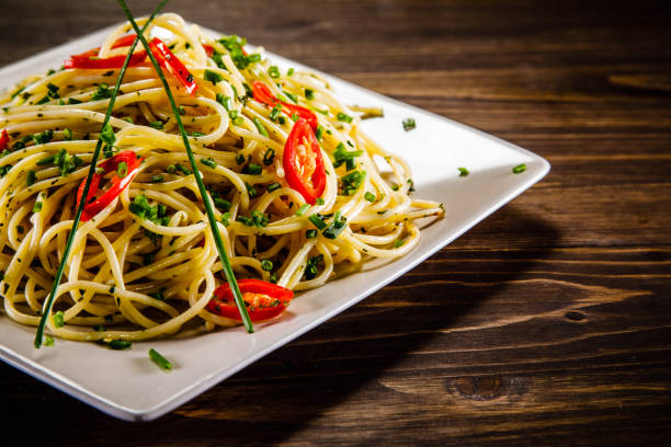 istock Pasta, pesto sauce and vegetables 1075456904